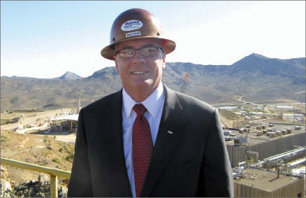 Mark Smith, Molycorp's president and CEO. For more than 24 years, Smith has been involved in the operation and development of the Mountain Pass rare earth element mine in southeastern California, seen in the background. Photo by Trish Saywell