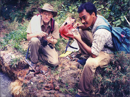 Senior geologist Al Workman and trainee geologist Waluyo Hadi on an epithermal gold project in Central Java, Indonesia in 1997. Photo by Watts, Griffis and McOuat