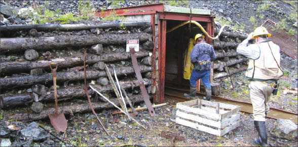 Geologist Rory Calhoun leads an analyst into an adit at Prophecy Platinum's Wellgreen PGM-nickel-copper project in the Yukon. Photo by The Northern Miner