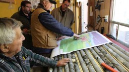 Geologists and consultants discuss the copper orebody at VMS Ventures' Reed project, 50 km west of Snow Lake, Manitoba. Photo by VMS Ventures