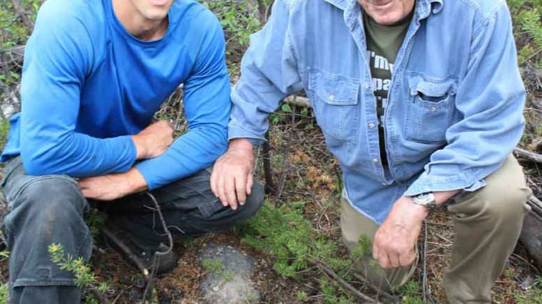 ESO Uranium project manager Garrett Ainsworth (left) with his father Ben, vice-president of exploration, at the Patterson Lake South uranium project in Saskatchewan. Photo by ESO Uranium