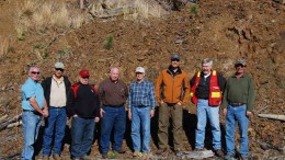 Mineral Mountain Resources president Nelson Baker (third from left) and VP of exploration Wally Rayner (fourth from left) with colleagues at the Holy Terror gold project in South Dakota, in which Mineral Mountain can earn up to a 75% stake from Holy Terror Mining. Photo by Mineral Mountain Resources