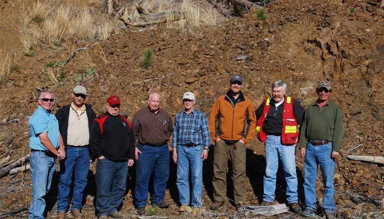 Mineral Mountain Resources president Nelson Baker (third from left) and VP of exploration Wally Rayner (fourth from left) with colleagues at the Holy Terror gold project in South Dakota, in which Mineral Mountain can earn up to a 75% stake from Holy Terror Mining. Photo by Mineral Mountain Resources