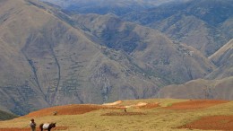 A farmer in the foreground at Panoro Minerals' Cotabambas copper-gold project in Peru. Photo by Ian Bickis