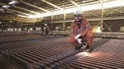 Examining cathode at BHP Billiton's Olympic Dam copper-uranium-gold mine and mill in South Australia. Photo by BHP Billiton