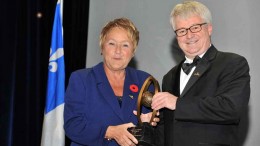 Fordia president Luc Paquet receives the Grand Prix from Quebec Premier Pauline Marois. Source: Fordia