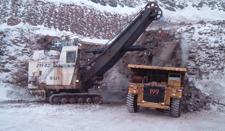 An electric rope shovel loads a dump truck at ArcelorMittal's Mont-Wright iron-ore mine in Quebec. Source: ArcelorMittal