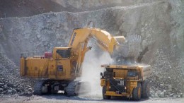 A shovel loads material onto a truck at Copper Mountain Mining's flagship copper mine 20 km south of Princeton, British Columbia. Photo by The Northern Miner.