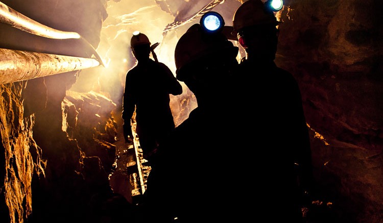 Miners walk through an underground tunnel at Continental Gold's Buritica project. Source: Continental Gold