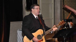 Retired miner Leo Cameron performs the "Five-Point Safety System Song" at the Canadian Mining Hall of Fame. Source: Canadian Mining Hall of Fame