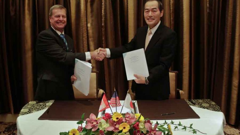 Garfield MacVeigh (left), president of Constantine Metal Resources, shakes hands with Nobuo Yamazaki, president of Dowa Metals & Mining, after reaching a joint-venture agreement for the Palmer VMS project in Alaska. Source: Constantine Metal Resources