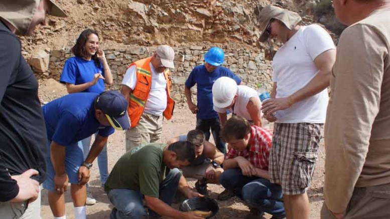 Ruben Aguilaro, who will be managing underground operations at Inca One's Corizona gold project, pans for gold while taking visitors on project tour. Source: Inca One Resources