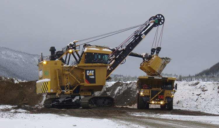 A shovel dumps a load into a haul truck at Thompson Creek Metals' Mount Milligan copper-gold project near Prince George, British Columbia. Photo by Gwen Preston