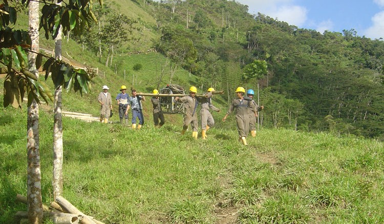 Workers haul drilling equipment at U3O8's Berlin project. Source: U3O8 Corp.