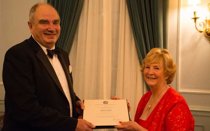 University of Toronto emeritus professor Tony Naldrett with Judith Kinnaird, incoming president of the Society of Economic Geologists, recognizing him as a senior fellow of the organization. Photo by Virginia Heffernan