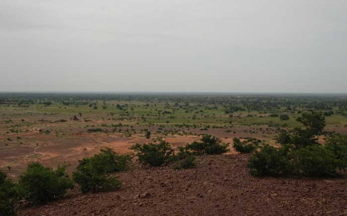 The view from a hill looking towards True Gold Mining's Goulagou II deposit at the Karma gold project in Burkina Faso. True Gold Mining