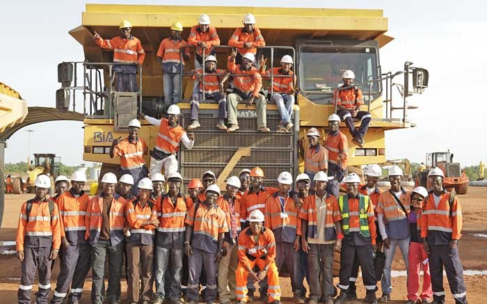 Employees pose for a picture at Teranga's Sabodala gold project in Senegal (2013). Source: Teranga Gold