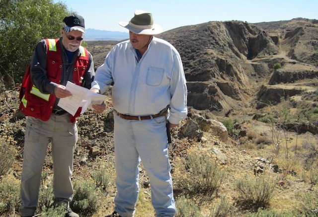 Defiance Silver CEO Bruce Winfield (left) and vice-president of exploration Richard Tschauder in front of the surface trace of the Veta Grande vein at the San Acacio silver project in Mexico's Zacatecas state. Photo by Salma Tarikh.