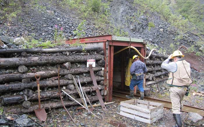 Men walk into an  adit at the Wellgreen PGM-nickel-copper project in the Yukon. Credit: Prophecy Platinum