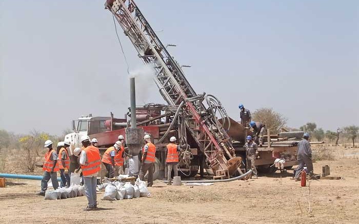 Workers at a drill site at True Gold Mining's Karma gold project in Burkina Faso. Credit: True Gold Mining