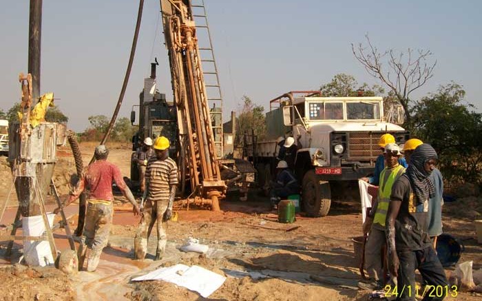 Drillers working at Bullman Minerals' Siguiri gold project in northeast Guinea. Credit:  Bullman Minerals