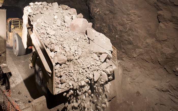 A haul truck dumps material at Iamgold's Niobec niobium mine, 25 km northwest of Saguenay, Quebec. Credit: Iamgold