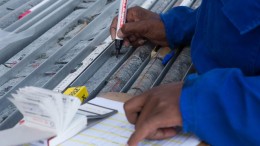 A geo technician checks core sampling at Platinum Group Metals'  Waterberg project on the North Limb of South Africa's prolific Bushveld Complex.