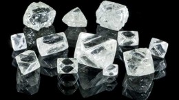 Twelve diamonds recovered from the bulk sample of the CH-6 kimberlite at Peregrine Diamonds' Chidliak project on Baffin Island. The largest stone is an 8.87-carat octahedron. The other stones range from 0.39 to 5.83 carats in size. Credit: Peregrine Diamonds