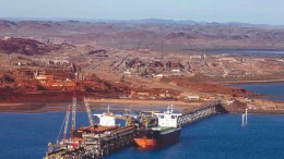 A ship receives a load at Rio Tinto's Pilbara iron-ore mining complex in Australia. Credit:  Rio Tinto