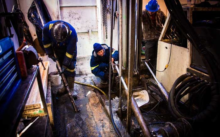 Drillers at work in a rig at Fission Uranium's Patterson Lake South uranium project in northern Saskatchewan. Credit: Fission Uranium