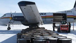 Supplies unloaded from an aircraft on a frozen lake at the Monument Bay property in March 2014. Photo by Anthony Vaccaro.