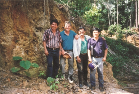 Bre-X Minerals personnel at the Busang property in Indonesia in 1996, from left: Jerry Alo, John Felderhof, Michael de Guzman and Cesar Puspos. Photo by Vivian Danielson of The Northern Miner.