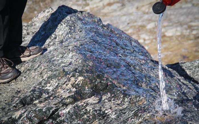 A surface showing of pink sapphire and ruby mineralization at True North Gems' Kigutilik gemstone project in Greenland. Credit: True North Gems