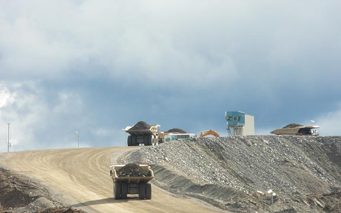 Trucks hauling material at Thompson Creek Metals' Mt. Milligan copper-gold mine in northern B.C. Photo by The Northern Miner