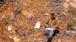 Dave Smith, Wallbridge Mining's JV manager, sampling at the North Range PGM project, where project partner Lonmin has recently invested $1 million for exploration. Credit: Wallbridge Mining