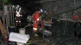 Geologist Scott Taylor examines core samples on a drill platform 244 metres underground at Rubicon Minerals' Phoenix F2 gold deposit in northwestern Ontario. Credit: Rubicon Minerals