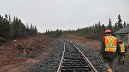 Workers near a railway at Labrador Iron Mines' Schefferville iron ore property in the Labrador Trough. Credit: Labrador Iron Mines