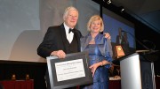 Inductee Peter Bradshaw accepts a plaque from Mining Matters president Patricia Dillon. Credit: Canadian Mining Hall of Fame