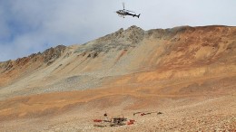 A helicopter delivers supplies at Amarc Resources' IKE copper-moly-silver project in south-central B.C. Credit: Amarc Resources