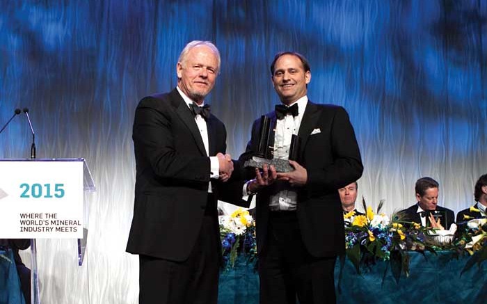 From left: Rod Thomas, president of the PDAC; David Palmer, president and CEO of Probe Mines, and winner of the Bill Dennis Award for a Canadian Discovery or Prospecting Success. Credit: ENVISIONDIGITALPHOTO.COM