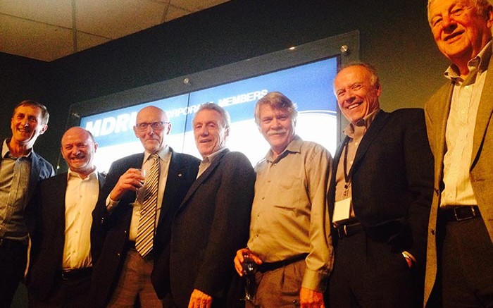 At the Mineral Deposit Research Unit's 25th anniversary celebration in Vancouver earlier this month. From left: John Thompson, past director; Craig Hart, current director; Al Sinclair, former dean of earth and ocean sciences at UBC; Ian Thomson, past director; Dick Tosdal, past director; John McDonald, co-founder; and Peter Bradshaw, co-founder. Photo by Lesley Stokes.