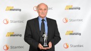 Engineer and Sonic Drilling president Ray Roussy holds his award from the International Mining Hall of Fame. Credit: Sonic Drilling