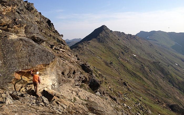 Geologist Doyle Albers in the field at at NovaCopper's Arctic copper project in Alaska. Photo by Scott Petsel.