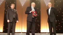 Simon Houlding (middle) accepts the 2015 Vale Medal for Meritorious Contributions to Mining from the Canadian Institute of Mining, Metallurgy and Petroleum in May. Credit: EduMine