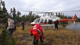 Field personnel approach a landing helicopter near Otter Lake at Paladin Energy's Michelin uranium project, 140 km northeast of Happy Valley-Goose Bay, Newfoundland and Labrador. Source: Paladin Energy