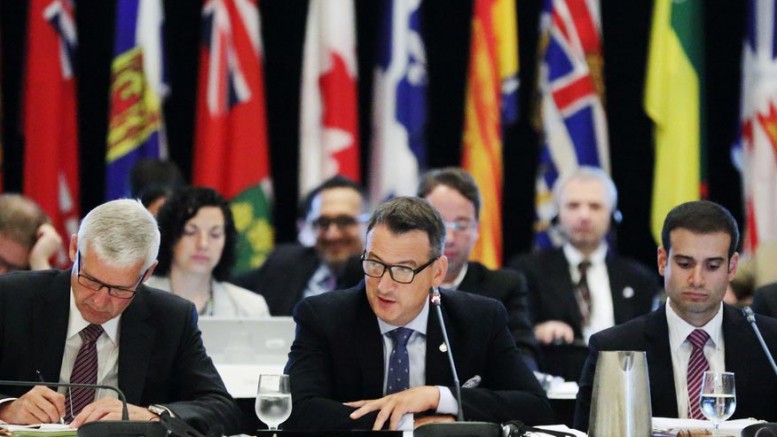 Canada's Minister of Natural Resources GregRickford (centre) at the 2015 Energy and Mines Ministers' Conference in Halifax on July 20. Source: Natural Resources Canada