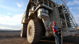 An employee climbs into a mining truck at Goldcorp's Peasquito polymetallic mine in Mexico. Source: Goldcorp
