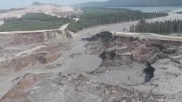 Toxic waste spills out of the tailings dam at Imperial Metals' Mount Polley copper-gold mine, shortly after its collapse in August 2014. Source: