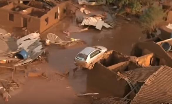 A screen shot of the wreckage caused by a large-scale tailing dam breach at the Samarco iron-ore joint venture in Brazil's Minas Gerais State. Source: YouTube