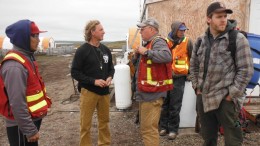 Northquest CEO Jon North (second from left) with colleagues at the Pistol Bay gold project, near the town of Whale Cove in eastern Nunavut. Credit: Northquest